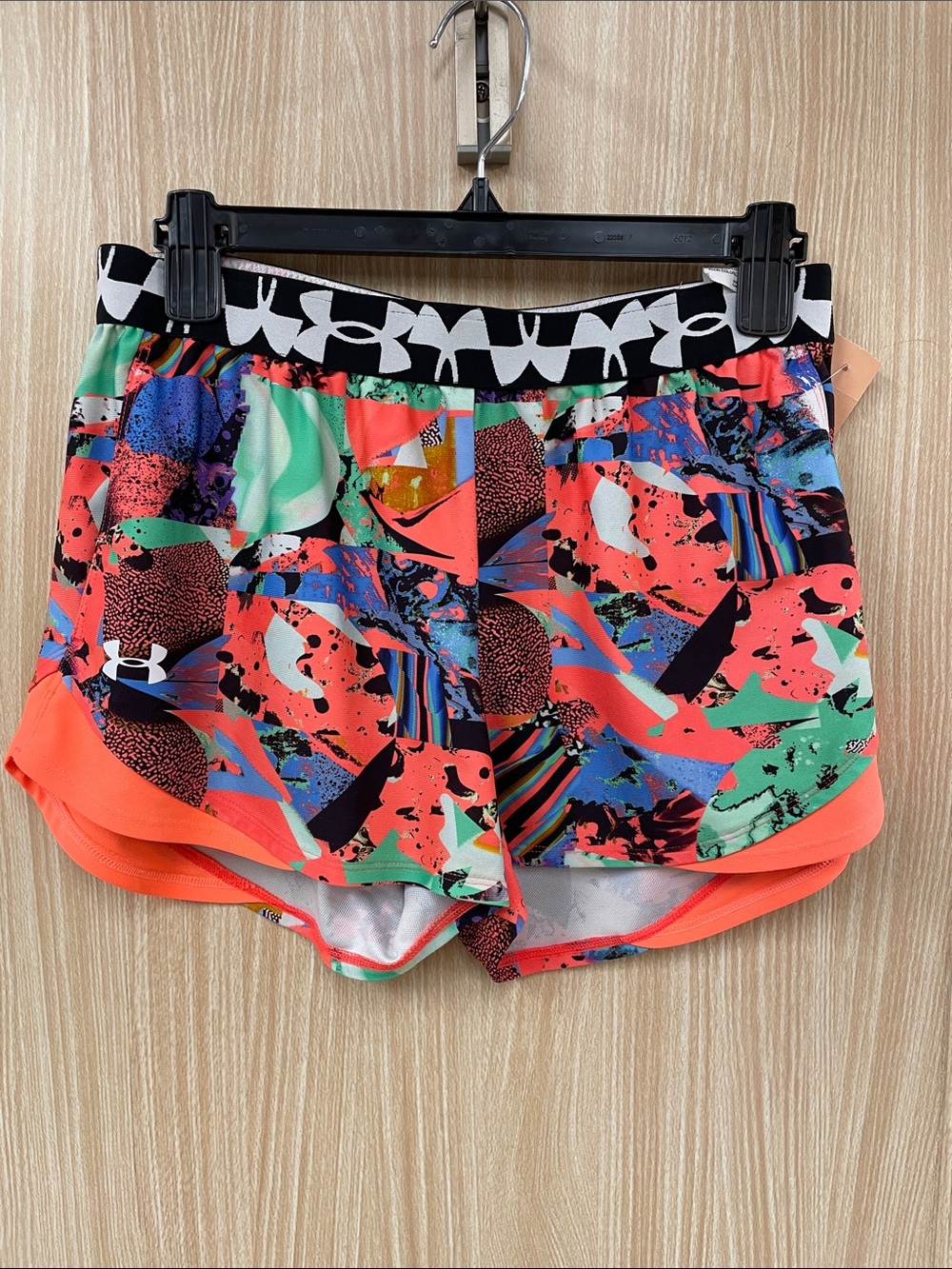 Under Armour orange print shorts size medium